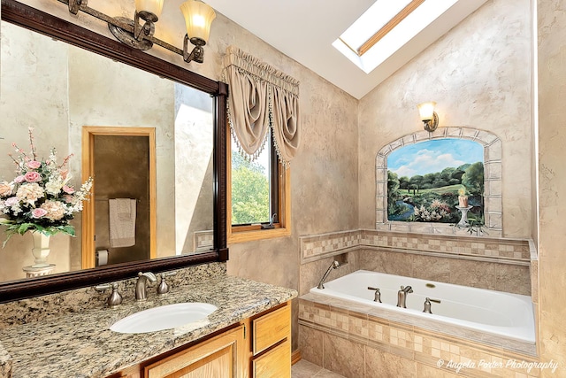 8720 Galleria Ct, Spring Grove, IL 60081 - bathroom with a skylight, lofted ceiling, a bath, vanity, and a textured wall
