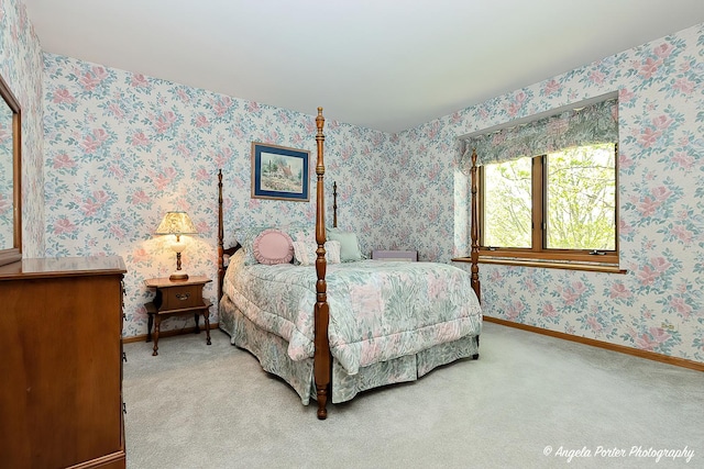 8720 Galleria Ct, Spring Grove, IL 60081 - bedroom with wallpapered walls, baseboards, and light colored carpet