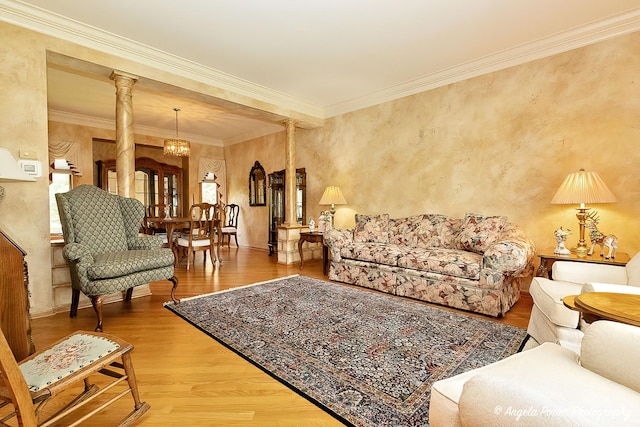 8720 Galleria Ct, Spring Grove, IL 60081 - living room with ornate columns, wood finished floors, a chandelier, and crown molding