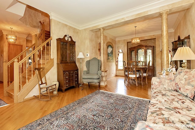 8720 Galleria Ct, Spring Grove, IL 60081 - living room with wood finished floors, ornate columns, stairway, baseboards, and ornamental molding