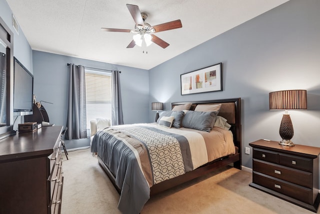 400 Village Cir Unit 207, Willow Springs, IL 60480 - bedroom featuring light carpet, baseboards, and a ceiling fan
