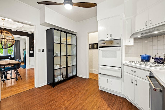 409 Cottage Ave, Glen Ellyn, IL 60137 - kitchen featuring a warming drawer, white appliances, ornamental molding, light countertops, and a chandelier