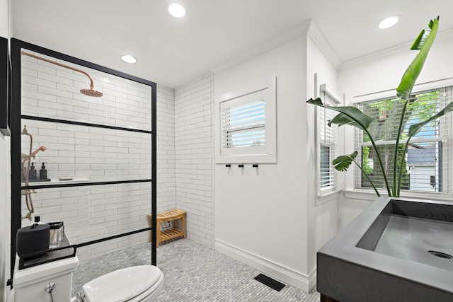 409 Cottage Ave, Glen Ellyn, IL 60137 - full bathroom featuring tiled shower, toilet, crown molding, recessed lighting, and baseboards