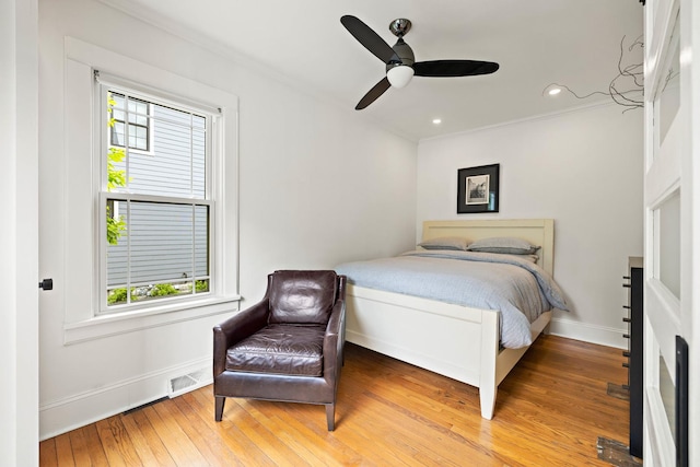 409 Cottage Ave, Glen Ellyn, IL 60137 - bedroom with ornamental molding, hardwood / wood-style floors, baseboards, and ceiling fan