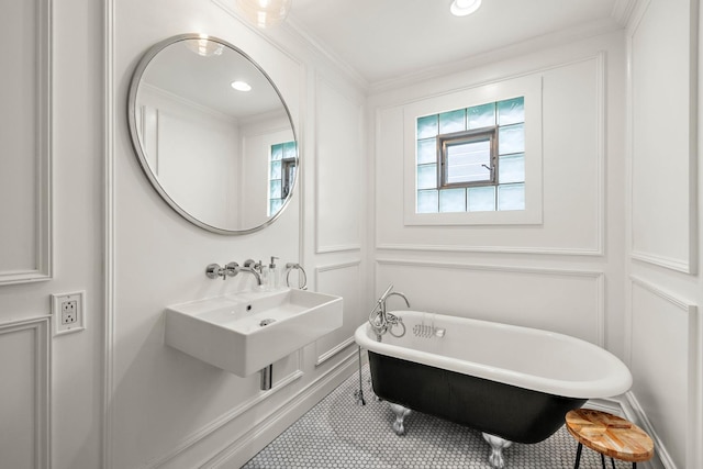 409 Cottage Ave, Glen Ellyn, IL 60137 - full bathroom featuring a sink, a soaking tub, a decorative wall, crown molding, and tile patterned flooring