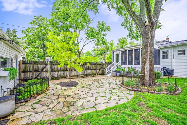 409 Cottage Ave, Glen Ellyn, IL 60137 - view of yard featuring a sunroom and a patio area