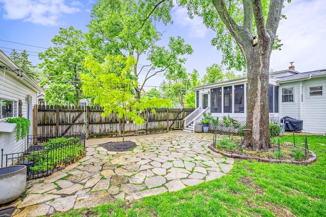 409 Cottage Ave, Glen Ellyn, IL 60137 - view of yard featuring a sunroom and a patio area