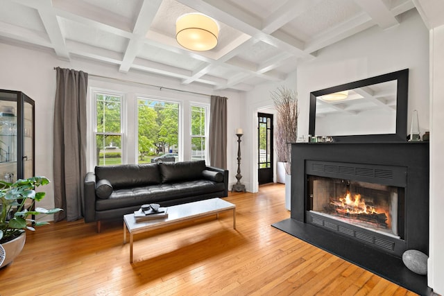 409 Cottage Ave, Glen Ellyn, IL 60137 - living area with coffered ceiling, beamed ceiling, hardwood / wood-style flooring, and a warm lit fireplace
