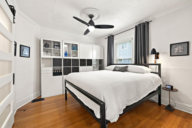 409 Cottage Ave, Glen Ellyn, IL 60137 - bedroom featuring light wood-style floors, ornamental molding, baseboards, and a ceiling fan
