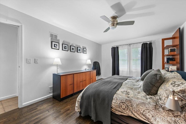7 Hampton On Auburn Dr, Rolling Meadows, IL 60008 - bedroom with dark wood-type flooring, baseboards, and a ceiling fan
