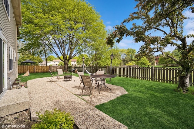 846 Dunhill Dr, Buffalo Grove, IL 60089 - view of yard with a fire pit and a patio area