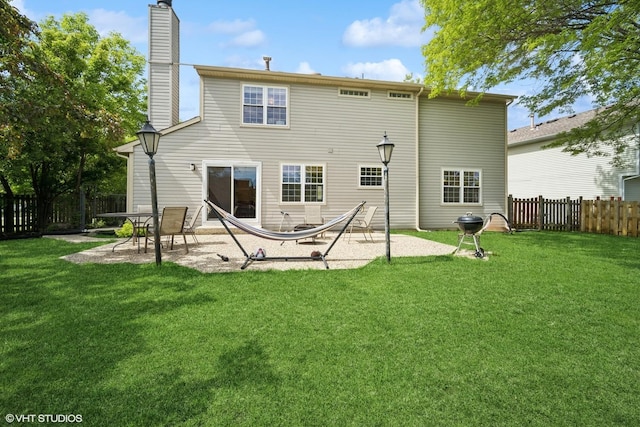 846 Dunhill Dr, Buffalo Grove, IL 60089 - back of property featuring a chimney and a patio