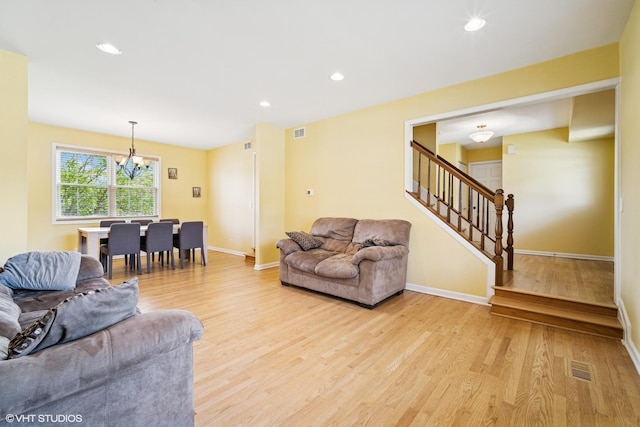 846 Dunhill Dr, Buffalo Grove, IL 60089 - living room featuring stairway, a chandelier, light wood-style floors, baseboards, and recessed lighting