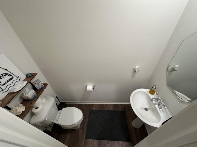 8506 Redbud Ct, Wonder Lake, IL 60097 - half bath featuring wood finished floors and a sink