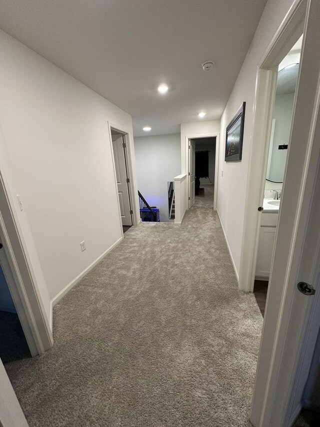 8506 Redbud Ct, Wonder Lake, IL 60097 - corridor with an upstairs landing, carpet floors, and recessed lighting
