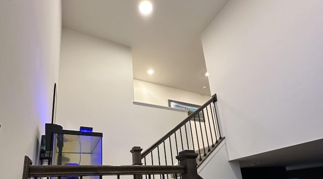 8506 Redbud Ct, Wonder Lake, IL 60097 - stairs featuring recessed lighting and a towering ceiling