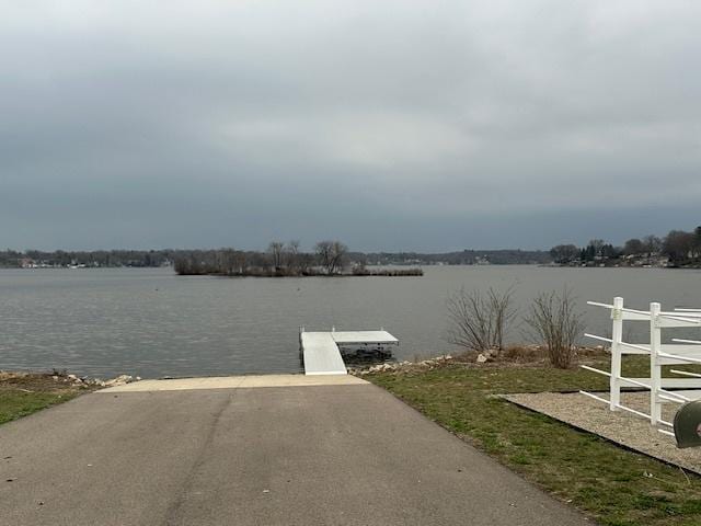 8506 Redbud Ct, Wonder Lake, IL 60097 - dock featuring a boat ramp and a water view