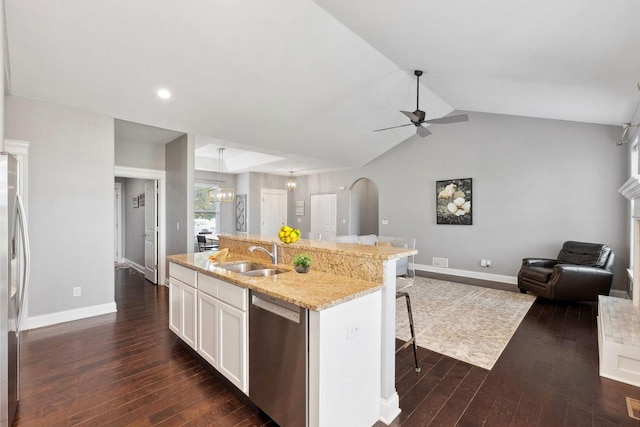 49 W Crabapple Ave, Cortland, IL 60112 - kitchen featuring appliances with stainless steel finishes, a sink, open floor plan, baseboards, and dark wood-type flooring