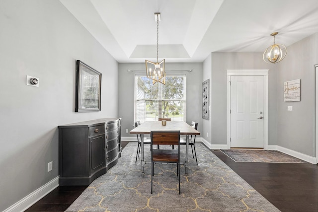 49 W Crabapple Ave, Cortland, IL 60112 - dining area featuring a chandelier, dark wood-type flooring, and baseboards
