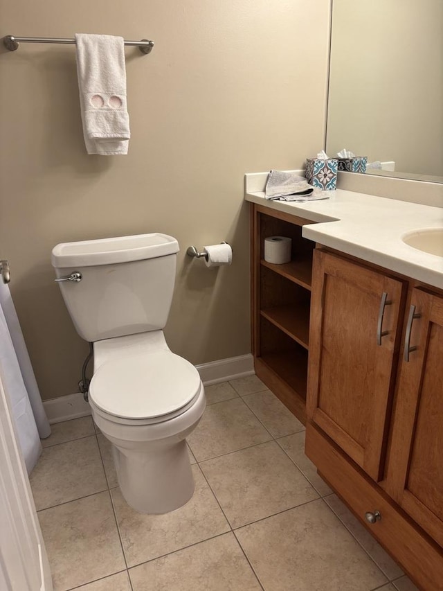 828 Graceland Ave Unit 206, Des Plaines, IL 60016 - bathroom featuring vanity, toilet, baseboards, and tile patterned floors