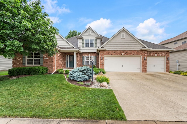 4804 Westborough Dr, Champaign, IL 61822 - view of front of house with a front yard, concrete driveway, a garage, and brick siding