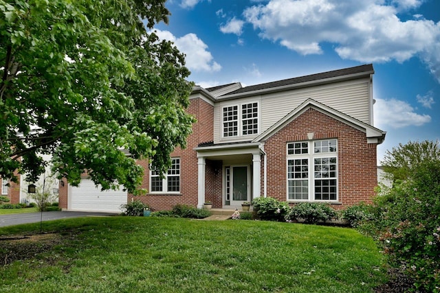 24316 W Bristol Ave, Plainfield, IL 60585 - view of front of home featuring asphalt driveway, brick siding, a front yard, and a garage