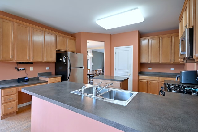 24316 W Bristol Ave, Plainfield, IL 60585 - kitchen with stainless steel appliances, a sink, and dark countertops