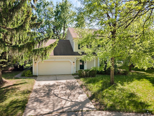 57 Huntcliff Ct, Fox River Grove, IL 60021 - view of front of property featuring an attached garage, concrete driveway, a shingled roof, and a front yard