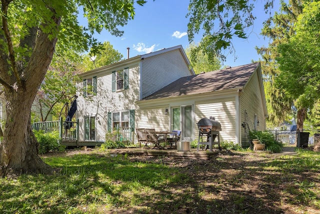 57 Huntcliff Ct, Fox River Grove, IL 60021 - rear view of house with a wooden deck and fence