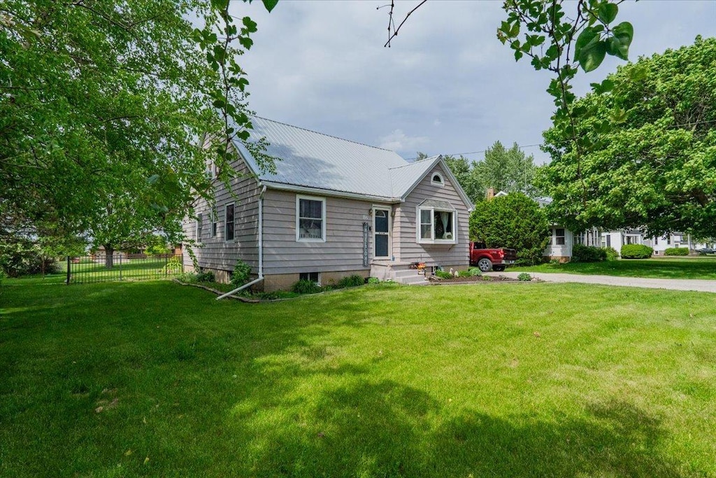 114 E State Route 116th St, Benson, IL 61516 - view of front of property with metal roof