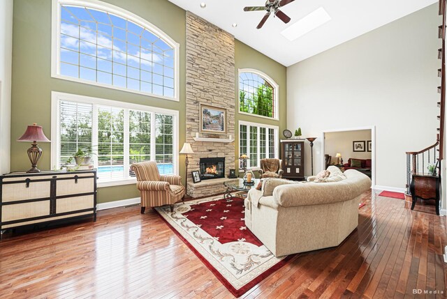 21359 Saddle Ln, Mokena, IL 60448 - living room with high vaulted ceiling, hardwood / wood-style floors, and plenty of natural light