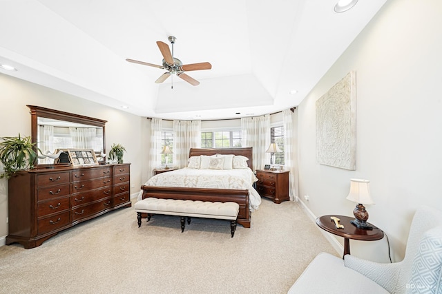 21359 Saddle Ln, Mokena, IL 60448 - bedroom featuring light colored carpet, a tray ceiling, recessed lighting, ceiling fan, and baseboards