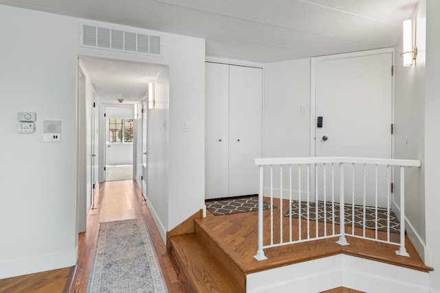 13206 N Country Club Ct Unit 1A, Palos Heights, IL 60463 - hallway with wood finished floors and baseboards
