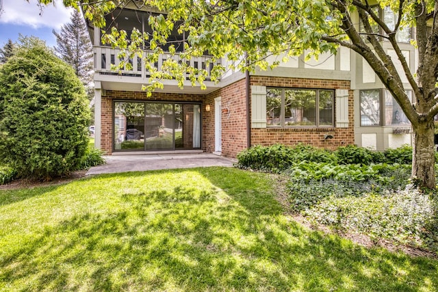 13206 N Country Club Ct Unit 1A, Palos Heights, IL 60463 - rear view of house with brick siding, a lawn, a balcony, and a patio area