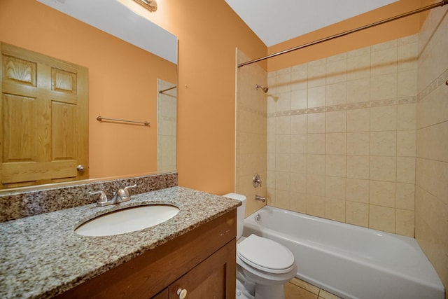full bath with toilet, bathtub / shower combination, tile patterned floors, and vanity