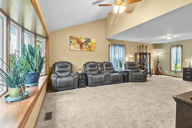 525 W Jackson St, Woodstock, IL 60098 - living room featuring carpet floors, vaulted ceiling, and ceiling fan