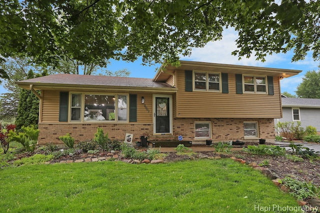 2007 Oak Dr, Mchenry, IL 60050 - tri-level home featuring brick siding and a front lawn