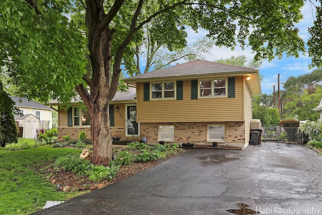 2007 Oak Dr, Mchenry, IL 60050 - tri-level home featuring brick siding, driveway, and a gate