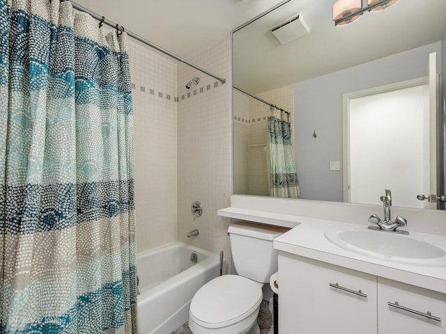 bathroom with toilet, shower / tub combo with curtain, and vanity