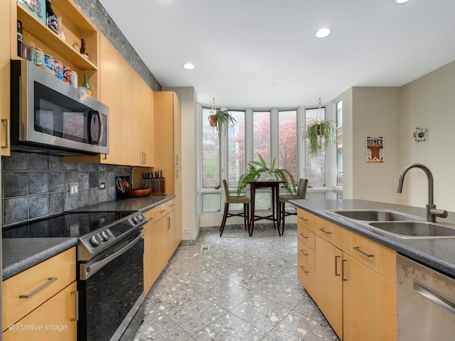 kitchen with stainless steel appliances, a sink, open shelves, decorative backsplash, and dark countertops
