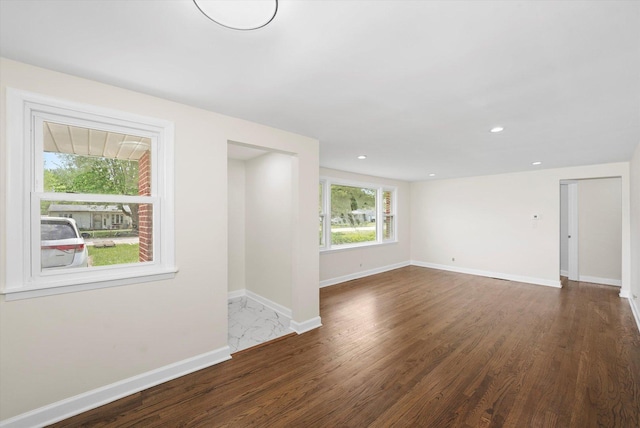 28 Liberty Blvd, Machesney Park, IL 61115 - empty room featuring wood finished floors, baseboards, and recessed lighting