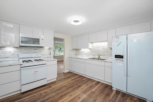 28 Liberty Blvd, Machesney Park, IL 61115 - kitchen with white appliances, a sink, tasteful backsplash, and white cabinetry