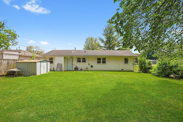 28 Liberty Blvd, Machesney Park, IL 61115 - rear view of house with a storage shed, an outdoor structure, and crawl space