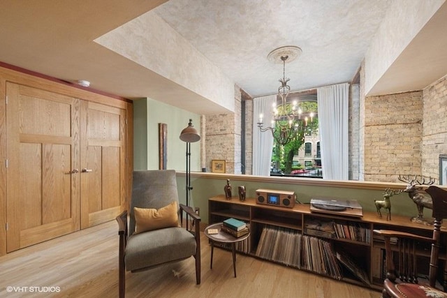 540 W Belden Ave Unit 1A, Chicago, IL 60614 - sitting room with wood finished floors and a chandelier