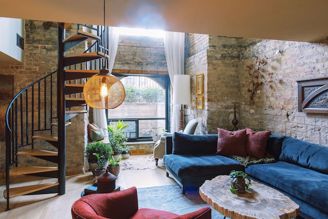 540 W Belden Ave Unit 1A, Chicago, IL 60614 - living area with stairway, wood finished floors, a high ceiling, and a fireplace