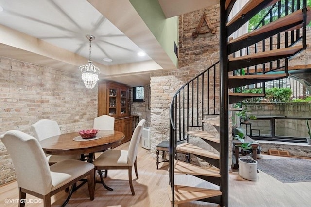 540 W Belden Ave Unit 1A, Chicago, IL 60614 - dining room with wood finished floors, stairway, and a chandelier