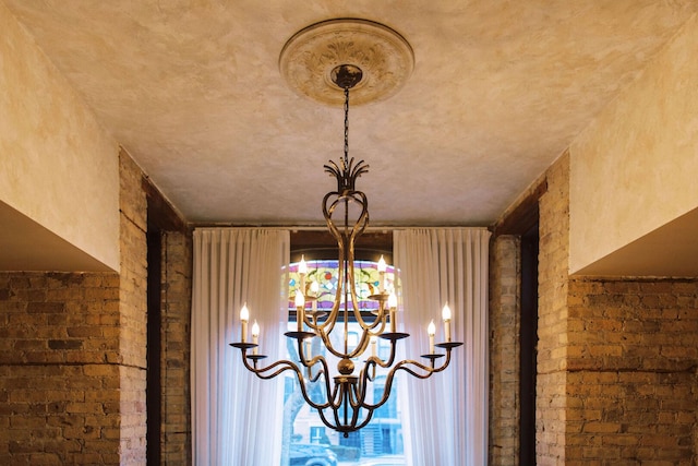 540 W Belden Ave Unit 1A, Chicago, IL 60614 - detailed view of a chandelier and brick wall