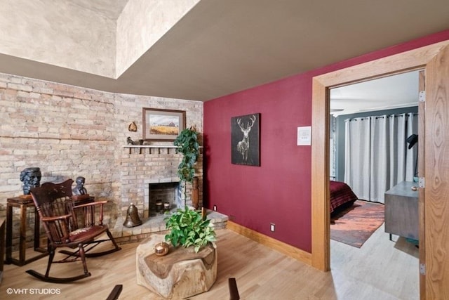 540 W Belden Ave Unit 1A, Chicago, IL 60614 - living area featuring wood finished floors, a fireplace, and baseboards