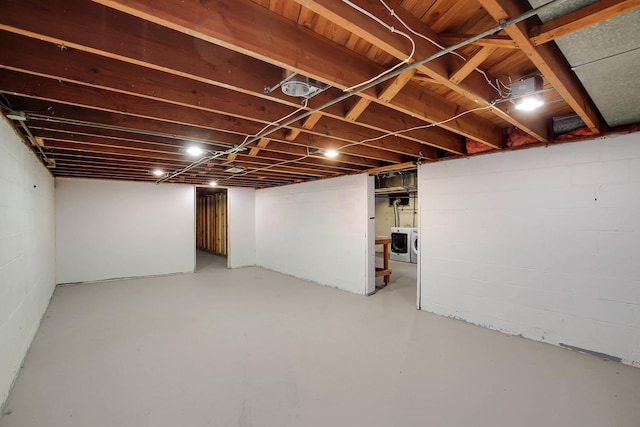805 Grand Blvd, Joliet, IL 60436 - below grade area featuring separate washer and dryer and concrete block wall