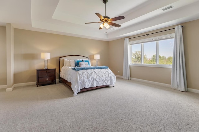 22709 Stanford Dr, Frankfort, IL 60423 - bedroom featuring a raised ceiling, baseboards, carpet, and a ceiling fan